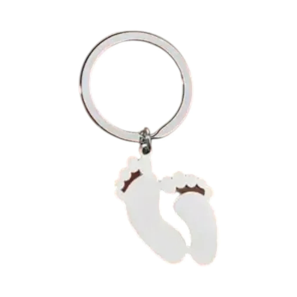 Make It Custom silver baby footprint shaped metal keychain with a sturdy circular ring attachment.