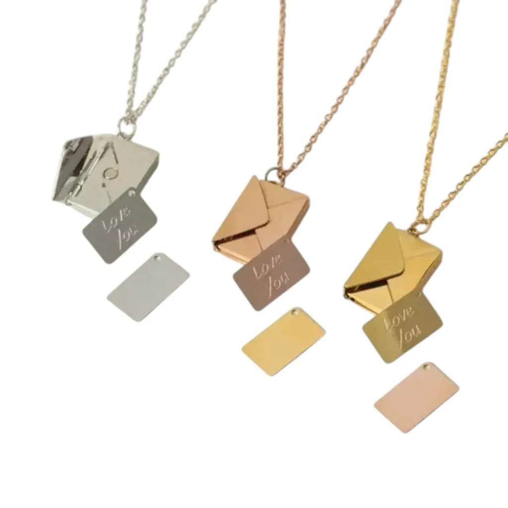 Make It Custom envelope pendant necklaces in silver, rose gold, and gold with pull-out Love You engraved notes.