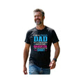 Make It Custom black crew neck t-shirt with Proud Dad graphic text worn by a smiling man in jeans.