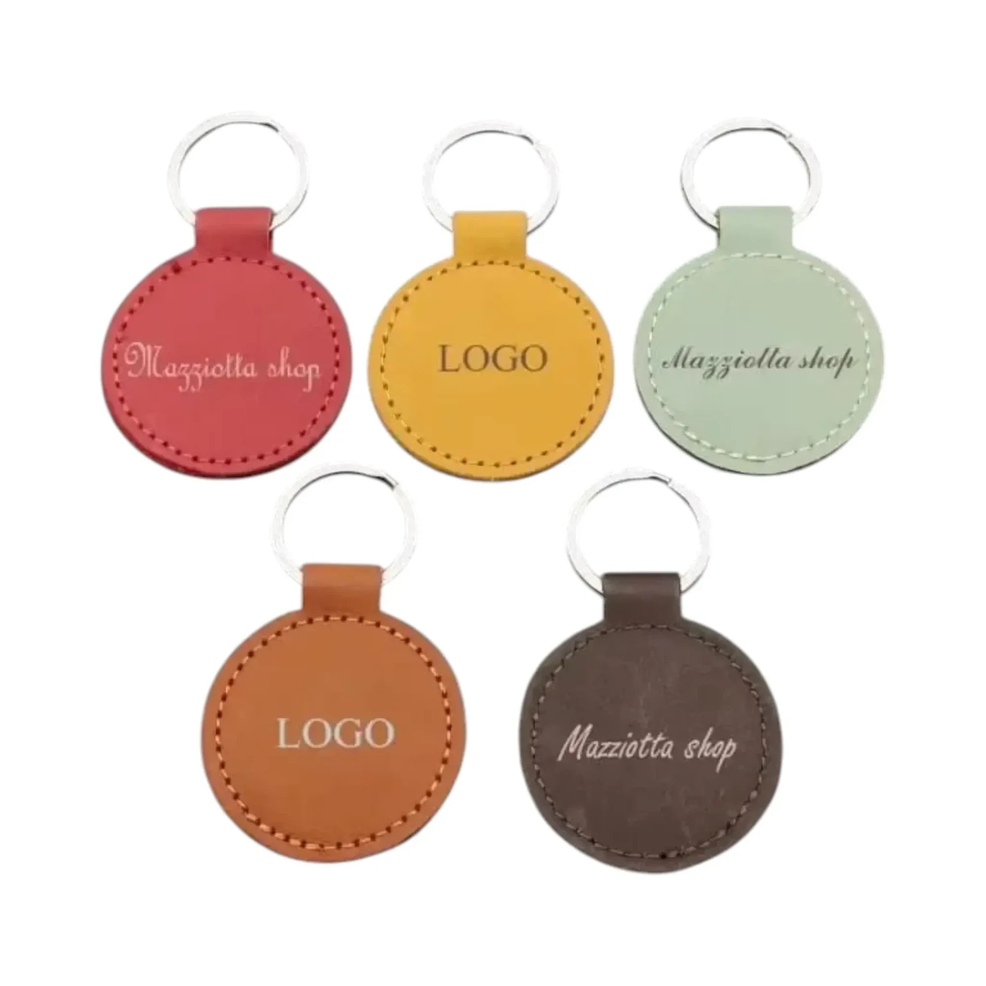 Make It Custom round leather keychains in red, yellow, green, orange, and brown with personalized logo engraving.
