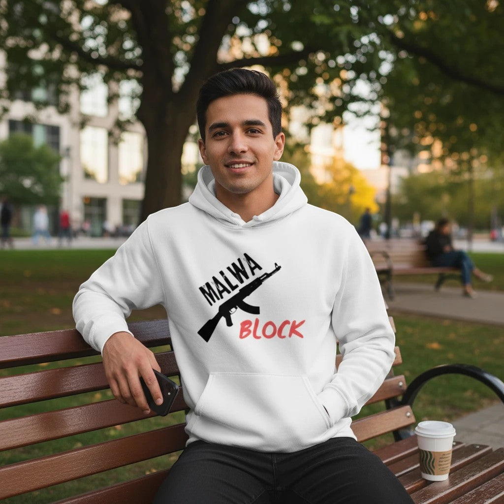 Make It Custom white pullover hoodie with Malwa Block rifle graphic worn by a man sitting on a park bench